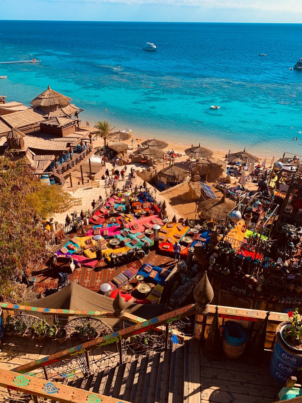 Beach scene at Naama Bay with Bedouin cushions and umbrellas
