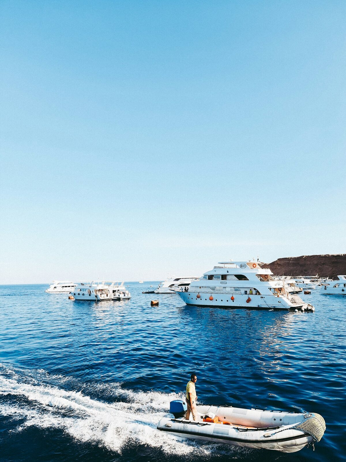 Sharm El Sheikh marina with yachts and Red Sea cliffs