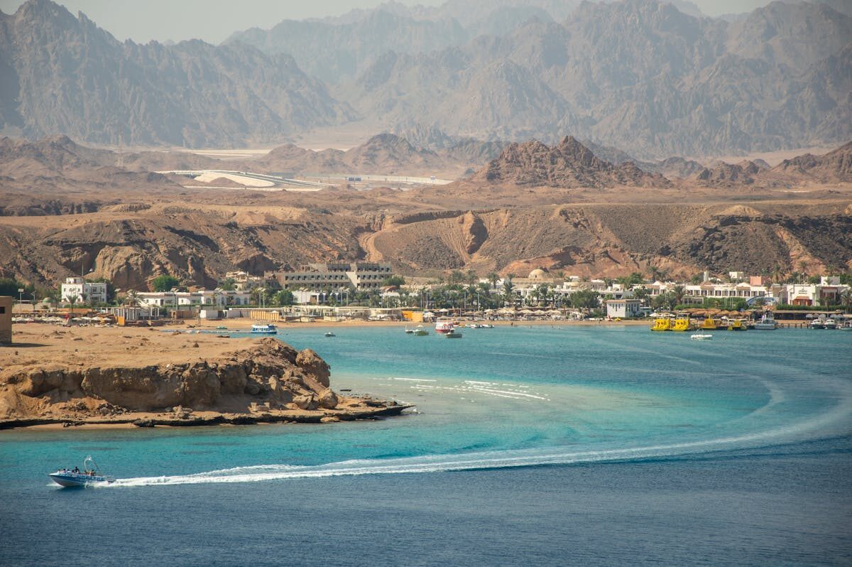 Clifftop bay view with Sinai mountains behind Sharm El Sheikh resorts